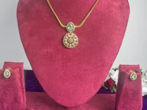 emarald green ad pendant necklace set with matching earrings