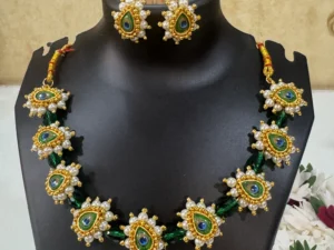 Traditional Peacock Eye Green Beaded Maharashtrian Gold Plated Necklace Set with Pearl Detailing and Matching Earrings by LuxeAlankar