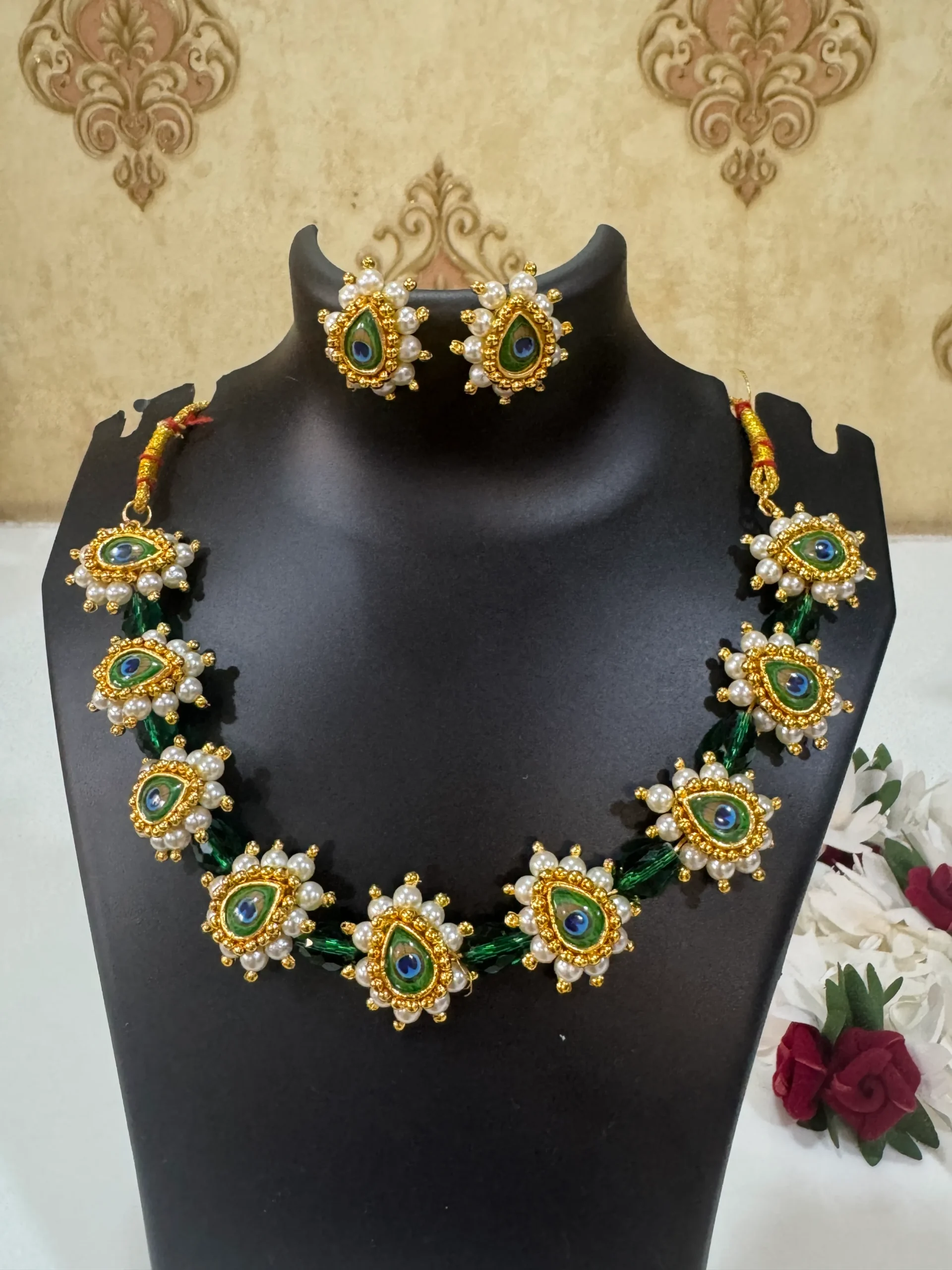 traditional drop peacock green beaded necklace set Traditional Peacock Eye Green Beaded Maharashtrian Gold Plated Necklace Set with Pearl Detailing and Matching Earrings by LuxeAlankar